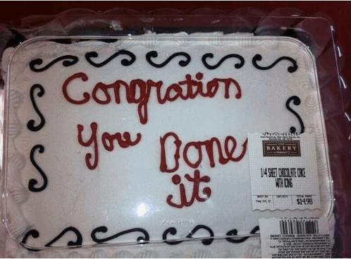An image of a cake which has the following words written on it: 'Congration! You done it!'